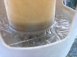 Winter ice on chicken drinker